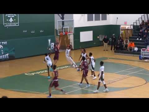 Mike Dunne scores in the post and gets T'd up