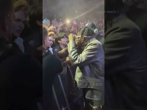 Travis Scott lets a fan perform with autotune 💀