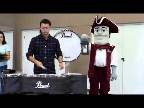 Sam the Minuteman visits the UMass drumline!