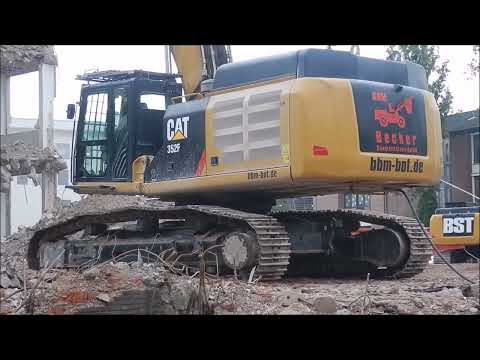 Bagger CAT 352 F - longfront Abriss  Telekom