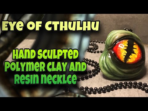 Cthulhu eye, polymer clay and resin jewelry.