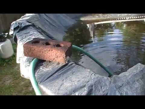 image-How do you drain a pool with a hose and pump?