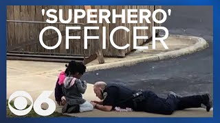 First he made sure they were safe, then this police officer lay down to play dolls with these girls
