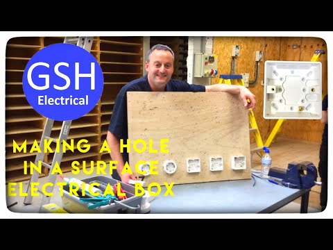 How to cut a hole in a surface plastic electrical box