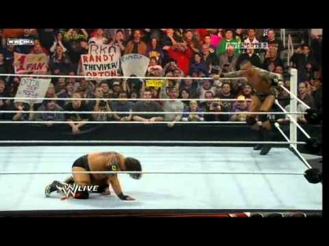 Randy Orton punts Husky Harris