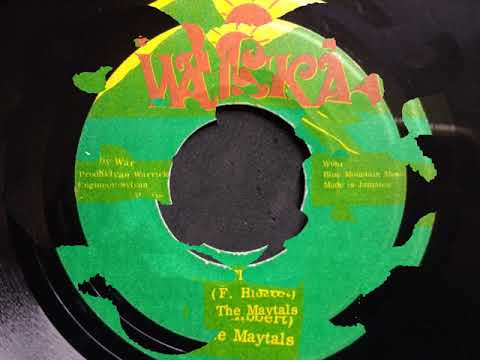 NEVER GO DOWN / IN THE FIRE -Toots & The Maytals.