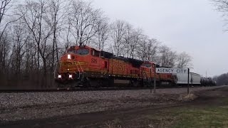 preview picture of video 'Two BNSF Dash 8s Pull Mixed Freight Train at Agency, Iowa'