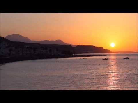 Different views over Mirtos from sunrise to nightfall