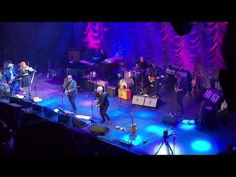 Elvis Costello & Allan Mayes as Rusty