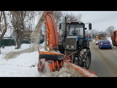 Plowing snow on the road 2023.