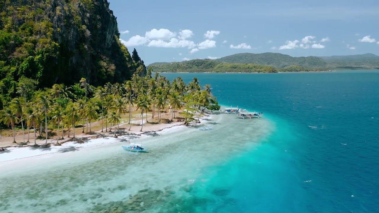 Experience the aerial panorama of Ipil Beach.