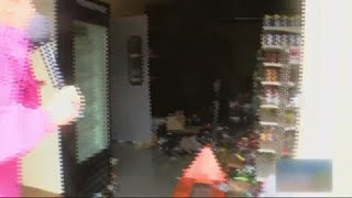 Looters break into Family Dollar Store and reporter confronts them