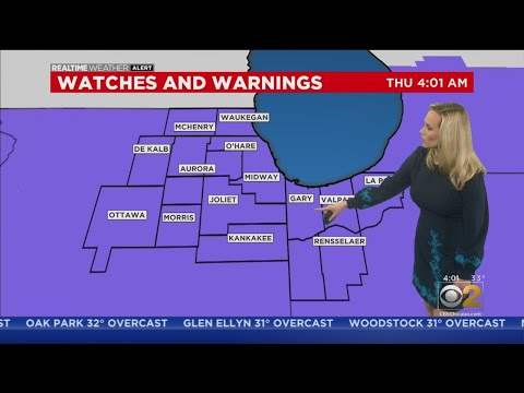 Snow Continues As Bitter Cold Temps Approach Chicago Area