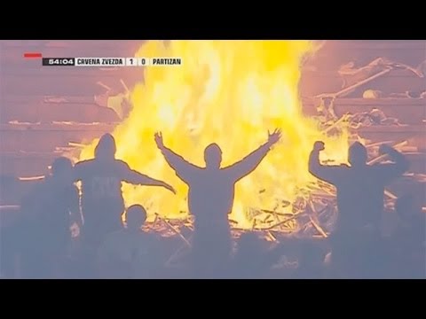 Crowd sets fire to stands at Belgrade derby match