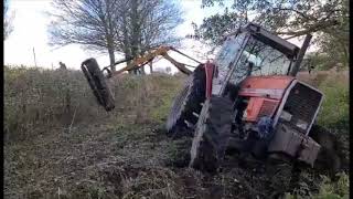 Massey and hedge cutter stuck, winched out by J & R Millington