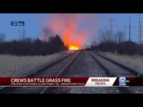 Crews battle brush fire near railroad tracks in Menomonee Falls