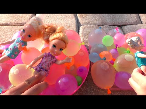 Elsa & Anna toddlers - pool - water balloons - water fun - floaties