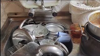 Dishwashing _where suds dissolve mess leaving behind a peaceful gleam