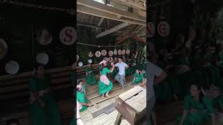 A traditional Philippine folk dance called "Tinikling".
