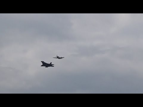 F-22 and P-51 Heritage Flight Overhead Break for Landing at the Gary/Chicago International Airport