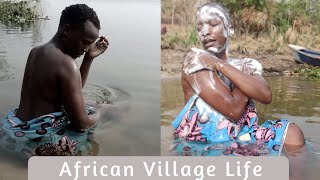 African Village Girl Bathing at the River // Villa