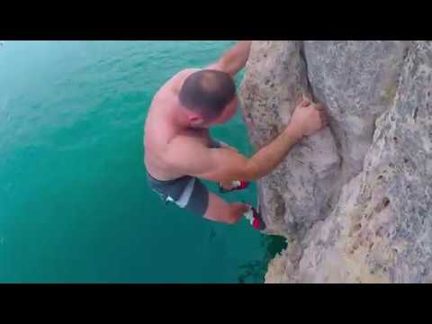 Deep water soloing (Psicobloc) in Mallorca Spain