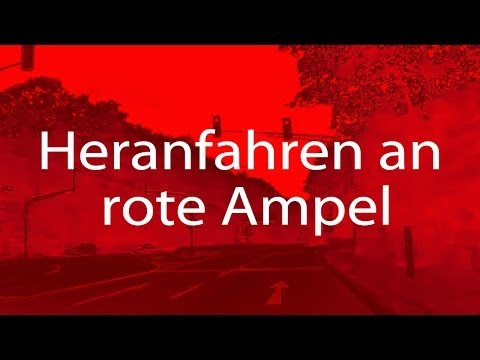 Die Ampel schaltet beim Heranfahren gerade auf ROT