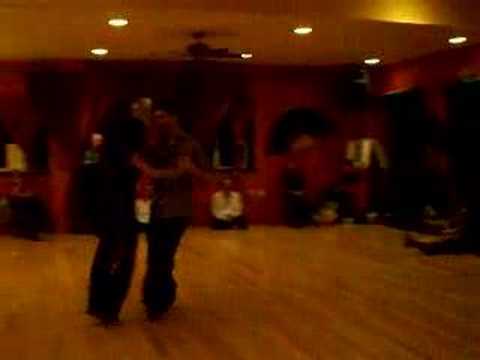  Luciana Valle  and  Alex Krebs  are  dancing  to  a  milonga