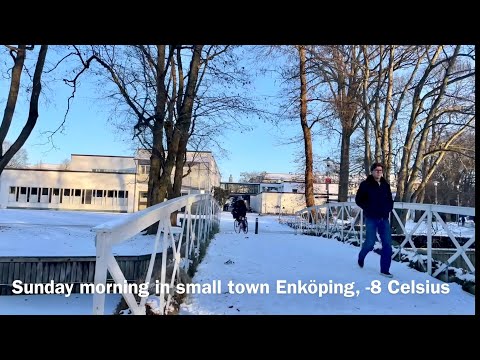 Swedish town Enköping. Snowy walk from the river to one of Sweden’s oldest & most  colorful churches