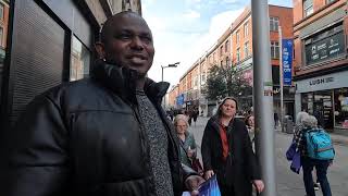 In Dublin: An Immigrant From Africa Has Difficulty Handing Out Flyers to Irish Citizens