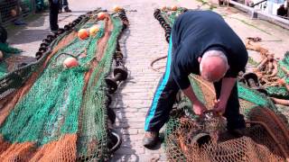 preview picture of video 'Repairing Nets Harbour Pittenweem East Neuk Of Fife Scotland'