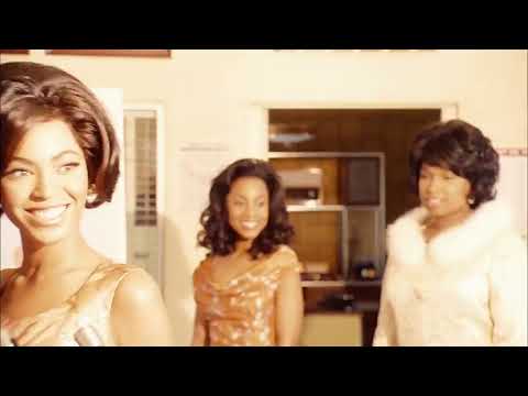 Official Dreamgirls (2006) trailer still: The Dreams onstage under gold spotlights