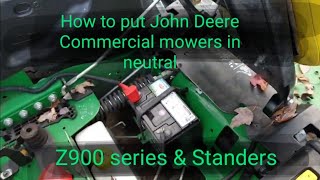 How to put John Deere commercial mowers in neutral. Releasing the transmissions to be able to push.