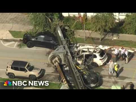 Four people injured in Miami construction crane collapse