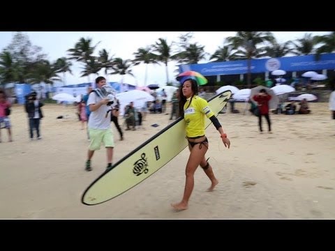 China's first female pro surfer to promote the sport on Hainan