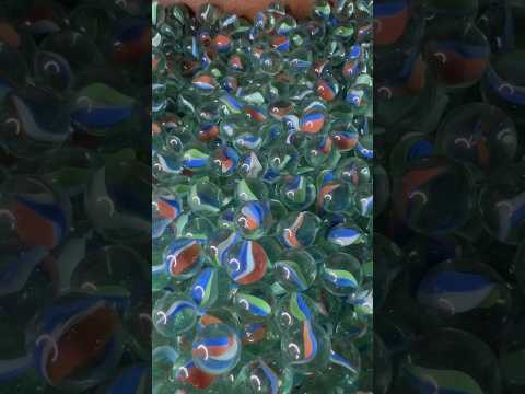 What happens when you put marbles in a rock tumbler?