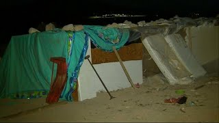 Couple arrested after kids found living in filthy shack