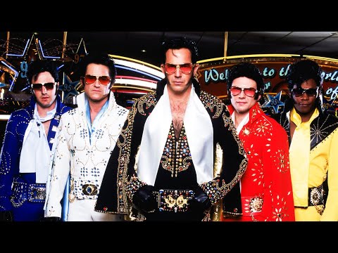 Trailer frame showing the crew in Elvis jumpsuits during the Las Vegas heist