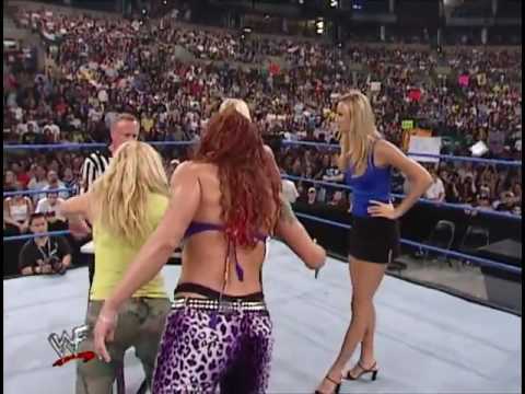 Trish Stratus With Lita vs Torrie Wilson With Stacy Keibler In An Arm Wrestling Match