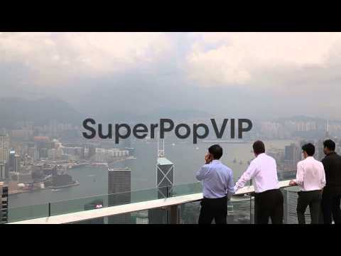 Tourists take in the view from the observation deck at th...