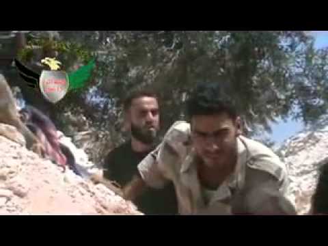 اشتباكات بين مقاتلي كتيبة 15 آذار  و قوات النظام بعد إعطاب تركس لقوات النظام في محيط معسكر وادي الضيف في ريف إدلب