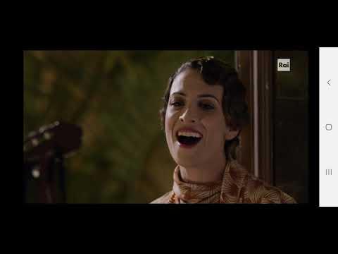 Livia canta "era de maggio" .Il commissario Ricciardi