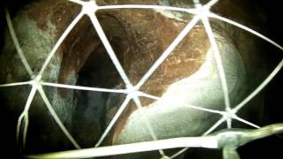 Drone flies in an underground abyss