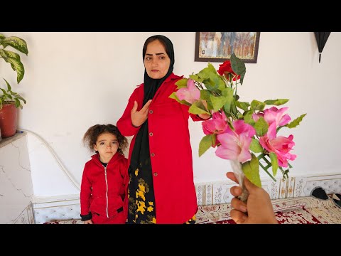 A simple gift, great joy for Afsaneh when she receives flowers from the cameraman