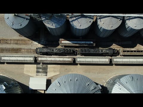 INER 3084 Indiana Northeastern Railroad loading a grain train with a control tower view of the cars
