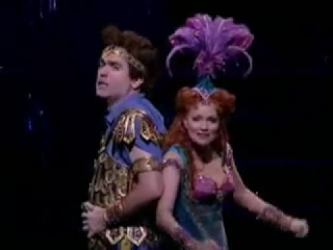 Promo still nodding to Passionella's movie-star fantasia with chorus framing