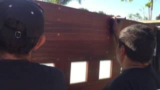 Pretty wood gate, blending color onto screw wood covers.