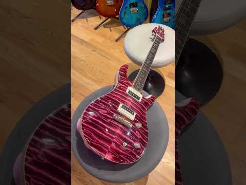 Stunning one of a kind PRS Guitars Private Stock McCarty Insane Quilt Maple top, pomegranate finish