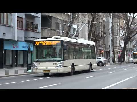 Trolleybuses Astra Citelis PS01T1 go one after another. Bucharest trolleybus European city.