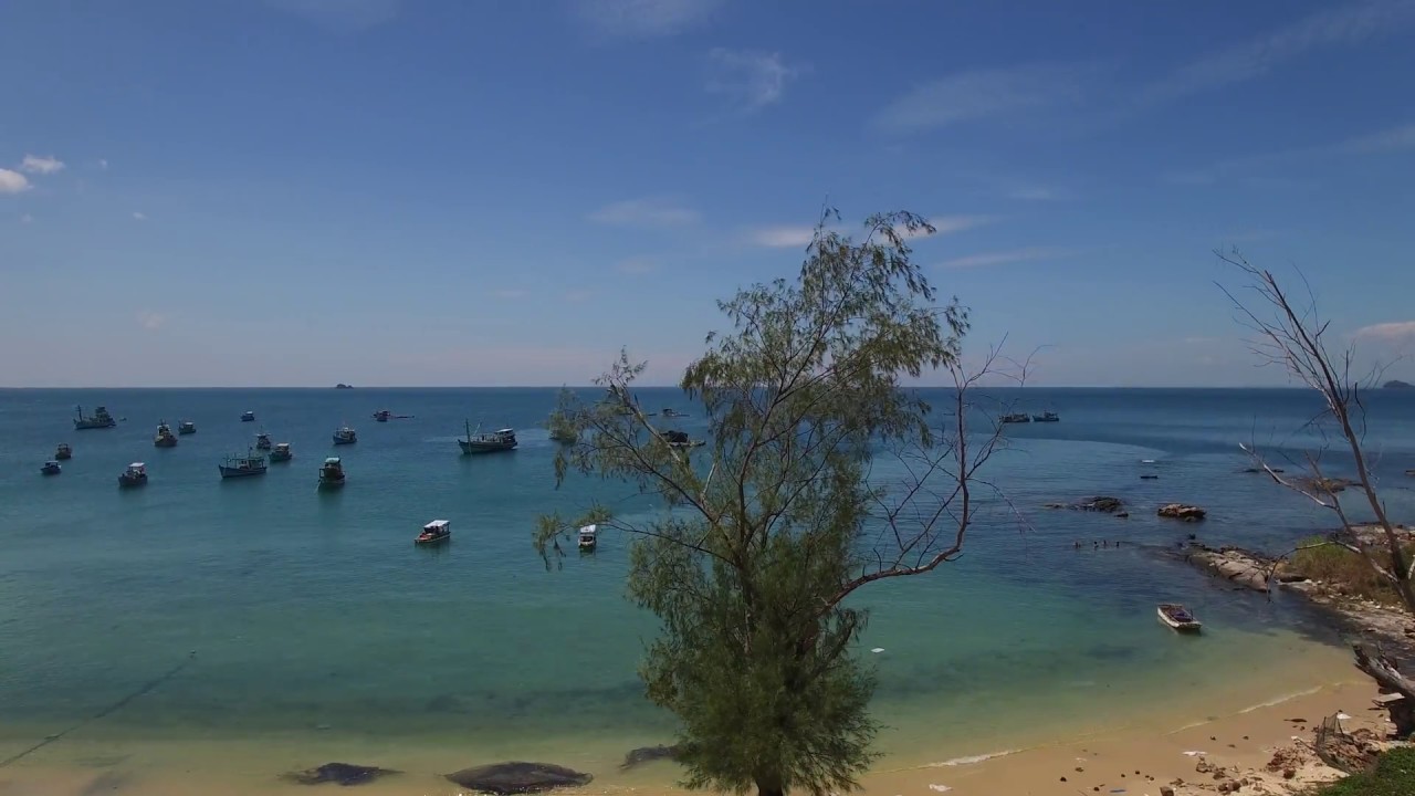 Discover tranquility at Ganh Dau Beach, surrounded by lush greenery and scenic views.